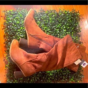 NWT brown boots made with textile and man made materials.